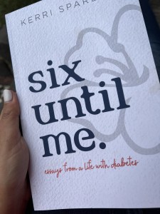 Front cover of the book 'Six Until Me Essays from a life with diabetes' The background is white and their is the outline of a flower in grey. 